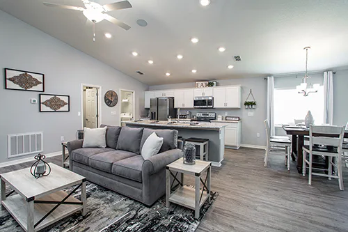 Lighting in the living area of Highland Homes' Peyton model home in Davenport, FL